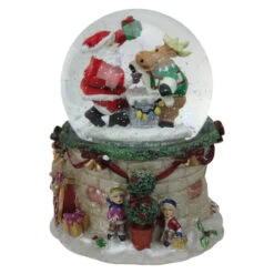 Northlight LED Lighted Santa And Reindeer Musical Christmas Snow Globe - 5.75"