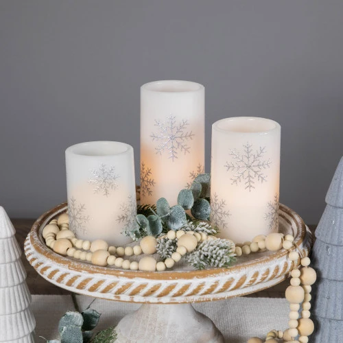 Northlight LED Flameless Flickering Wax Pillar Snowflake Christmas Candles - 6" - Set Of 3 5 Northlight LED Flameless Flickering Wax Pillar Snowflake Christmas Candles - 6" - Set Of 3 - Image 3